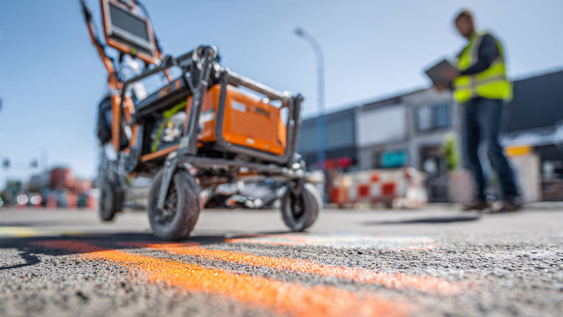 Surveyor Using Ground Penetrating Radar Cart on Site